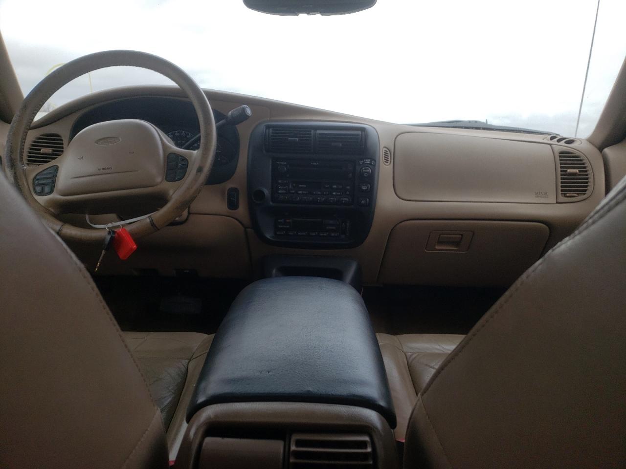 Photo 9 from auction – 2000 FORD EXPLORER E with VIN 1FMDU64E4YUB61921
