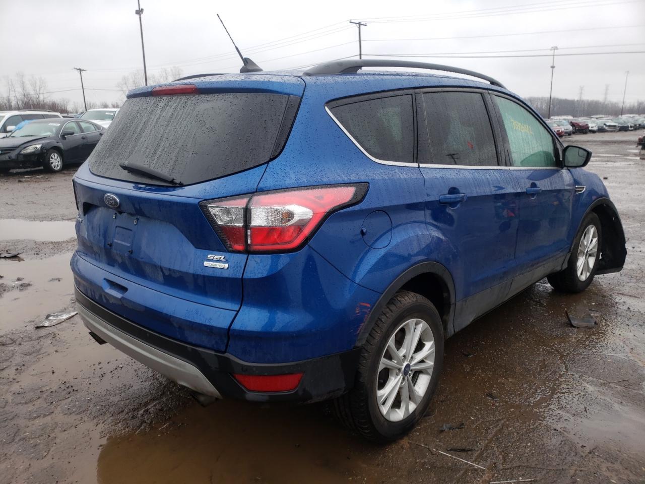 Photo 4 from auction – 2018 FORD ESCAPE SEL with VIN 1FMCU0HD7JUD27929