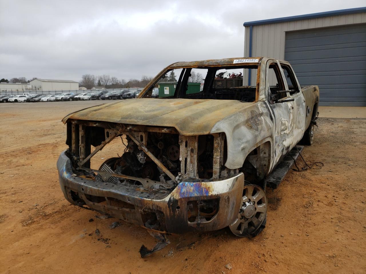 Photo 2 from auction – 2015 GMC SIERRA K35 with VIN 1GT423E84FF151005