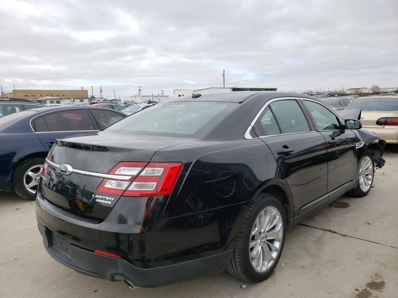 Photo 4 from auction – 2015 FORD TAURUS LIM with VIN 1FAHP2F85FG110412