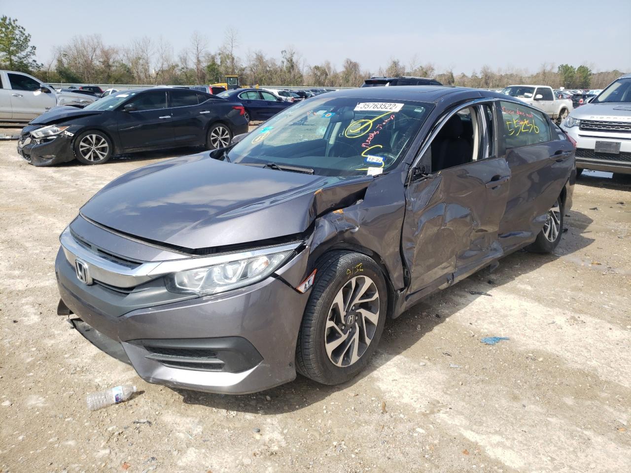Photo 2 from auction – 2018 HONDA CIVIC EX with VIN 2HGFC2F76JH604491
