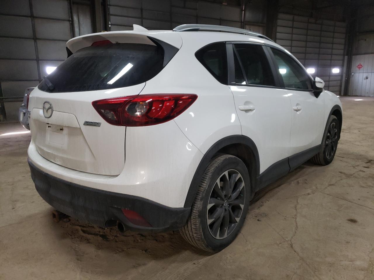 Photo 4 from auction – 2016 MAZDA CX-5 GT with VIN JM3KE4DYXG0642809