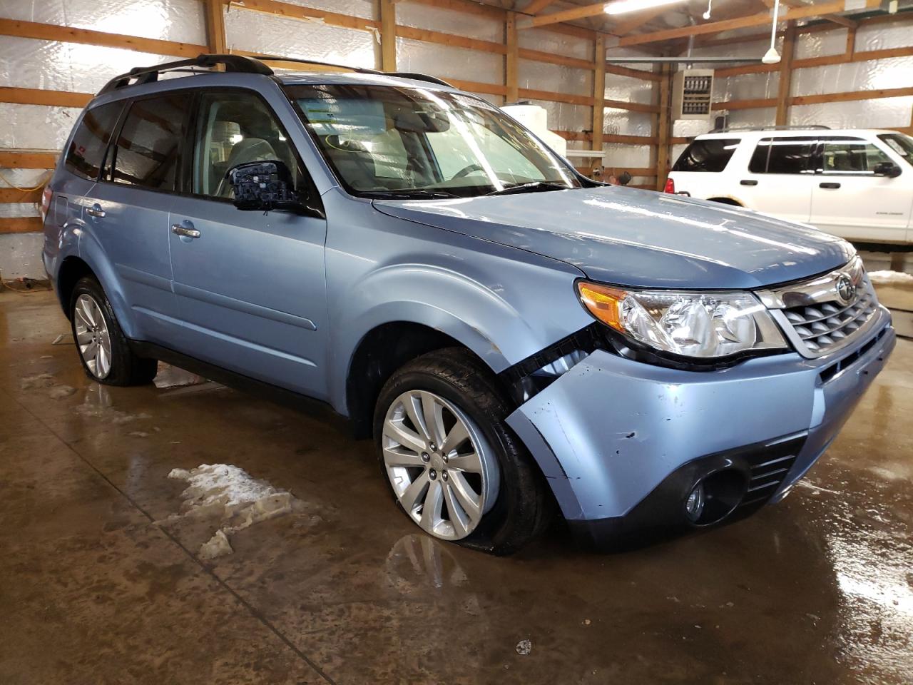 SUBARU FORESTER L 2011 with VIN JF2SHBFC4BH708126 - Photo from auction