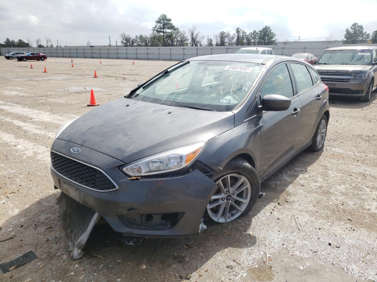 Photo 2 from auction – 2018 FORD FOCUS SE with VIN 1FADP3K28JL241856