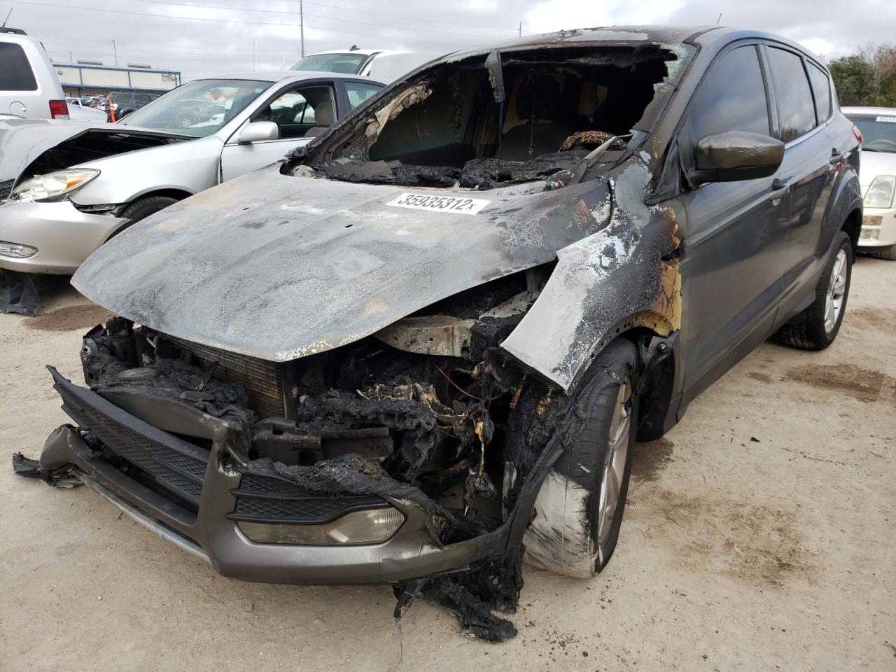 Photo 2 from auction – 2014 FORD ESCAPE SE with VIN 1FMCU0GX0EUE07056