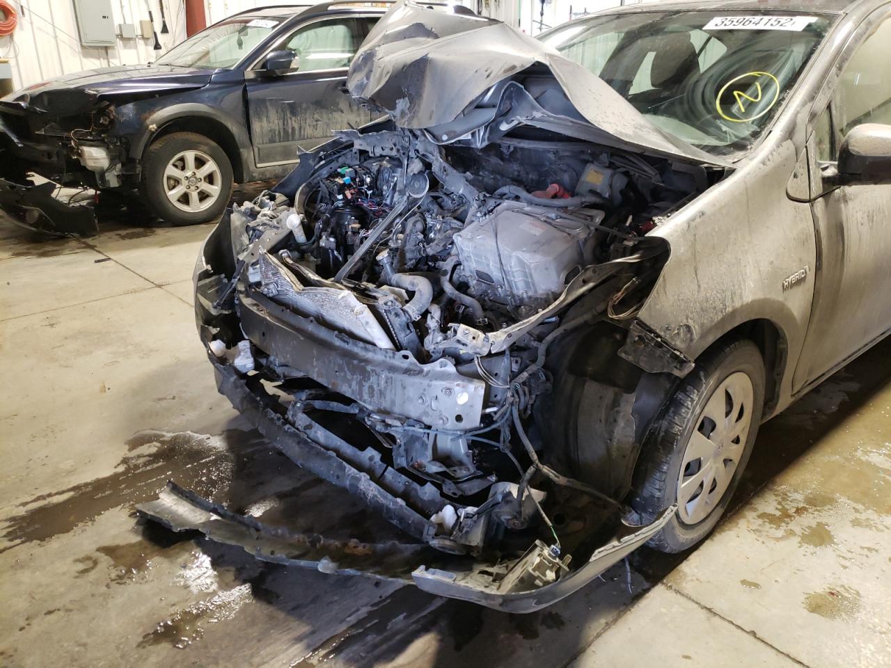 Photo 9 from auction – 2014 TOYOTA PRIUS C with VIN JTDKDTB31E1573495