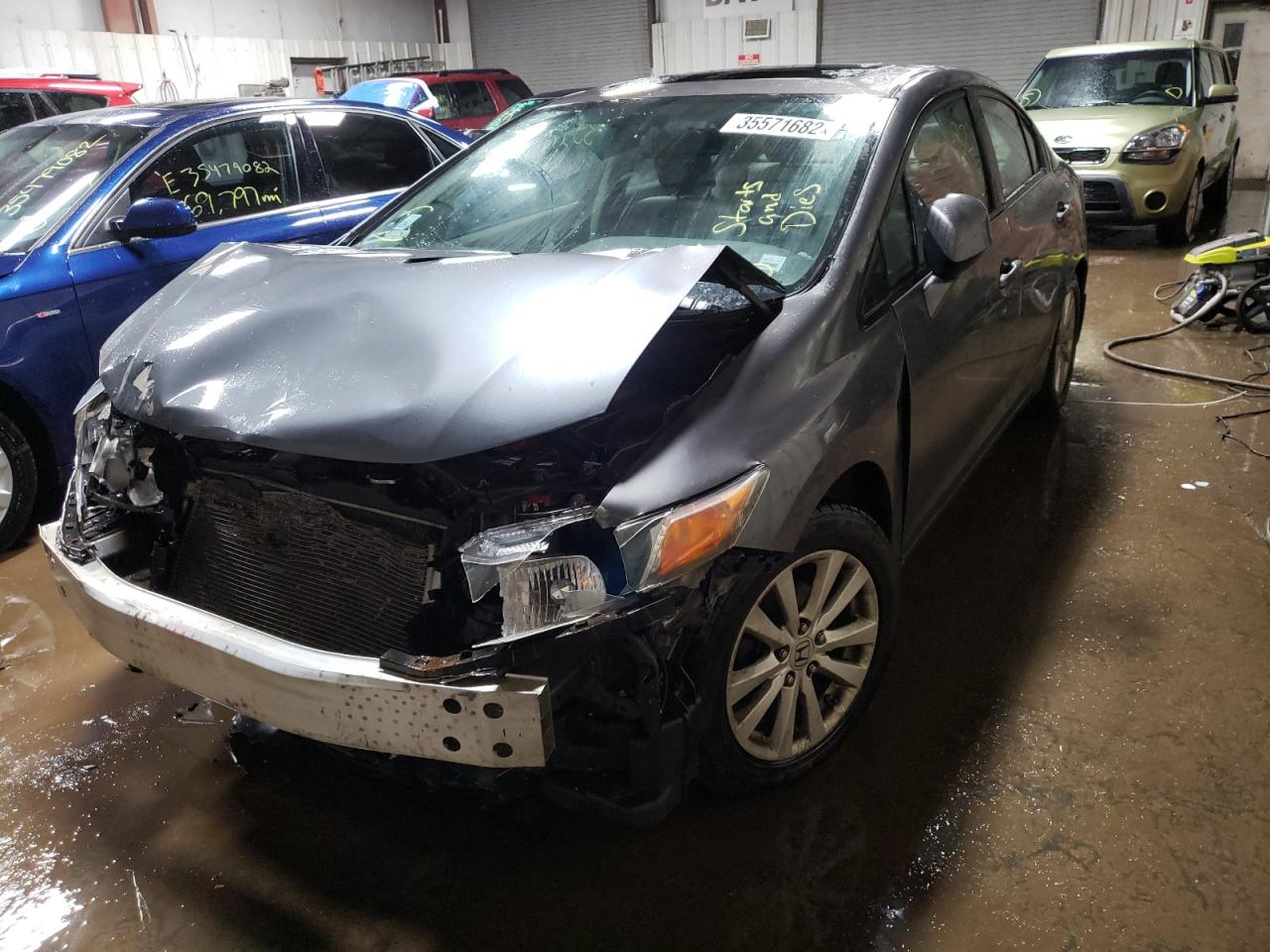 Photo 2 from auction – 2012 HONDA CIVIC EXL with VIN 2HGFB2F92CH510826