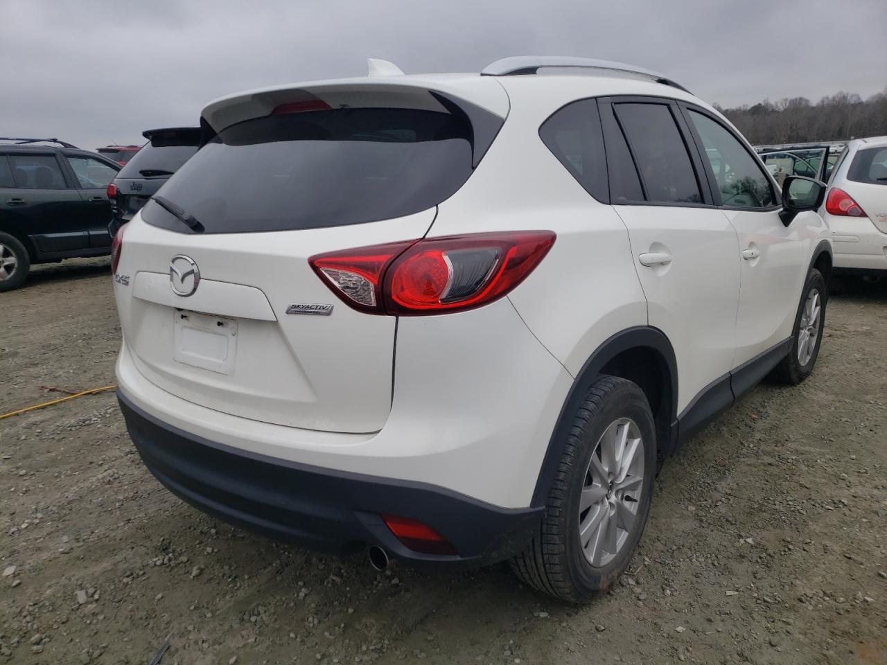 Photo 4 from auction – 2015 MAZDA CX-5 TOURI with VIN JM3KE2CY8F0474396