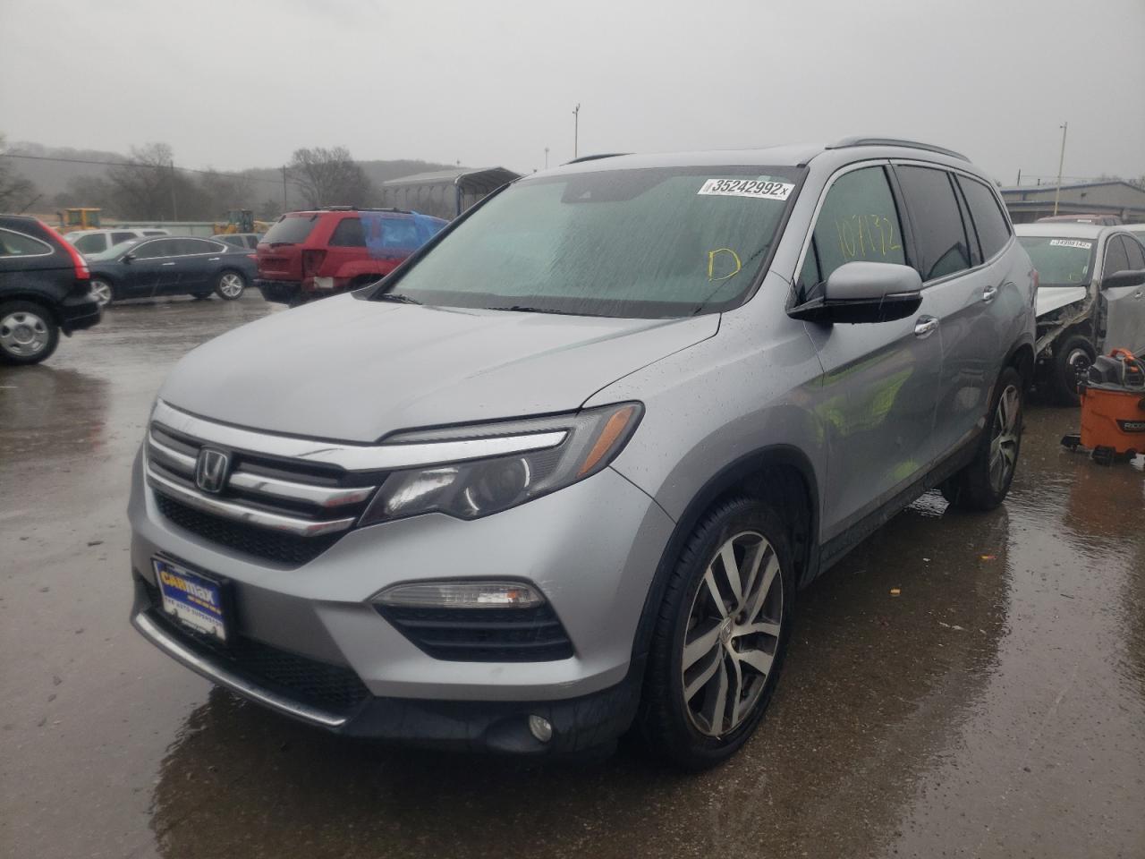 Photo 2 from auction – 2016 HONDA PILOT TOUR with VIN 5FNYF6H98GB084622