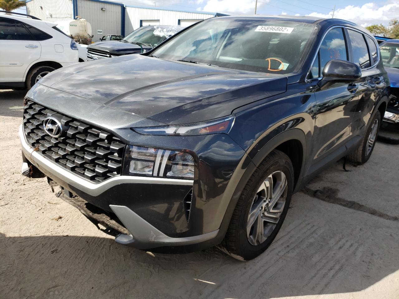 Photo 2 from auction – 2022 HYUNDAI SANTA FE S with VIN 5NMS14AJ5NH404018