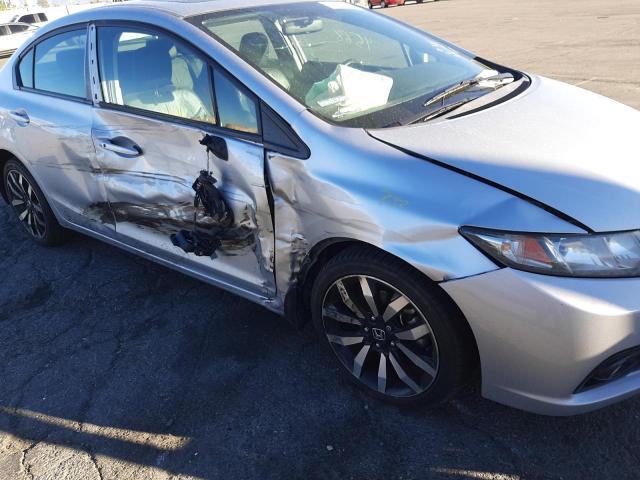 Photo 9 from auction – 2014 HONDA CIVIC EXL with VIN 2HGFB2F95EH517529
