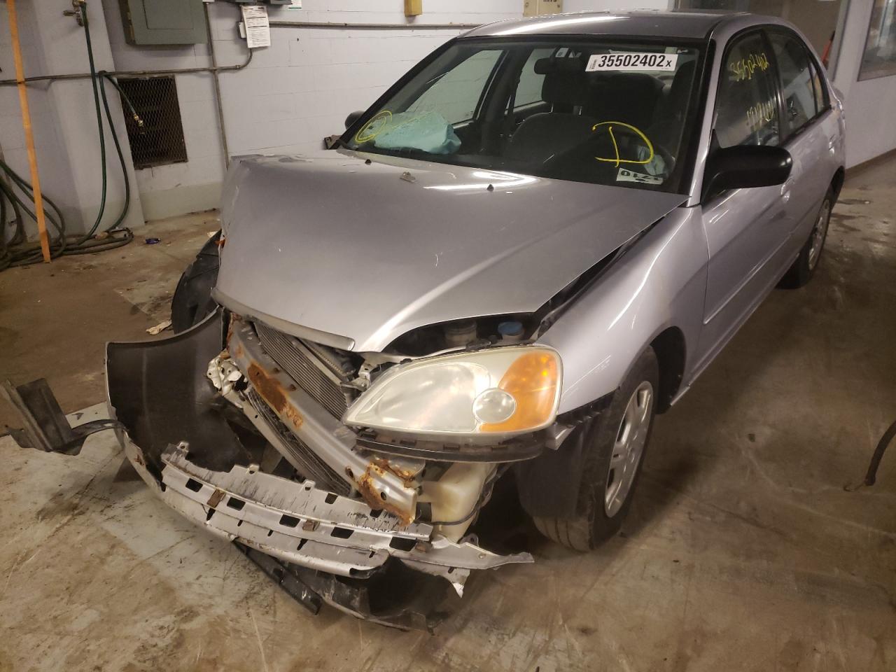 Photo 2 from auction – 2002 HONDA CIVIC LX with VIN 1HGES15522L024944