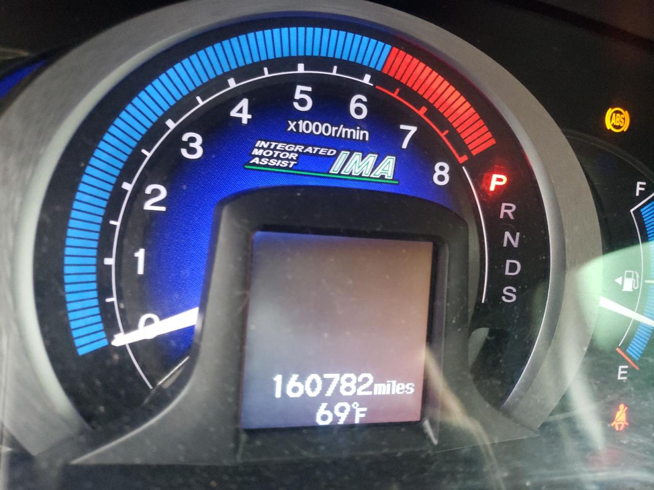 Photo 8 from auction – 2010 HONDA INSIGHT EX with VIN JHMZE2H78AS025903