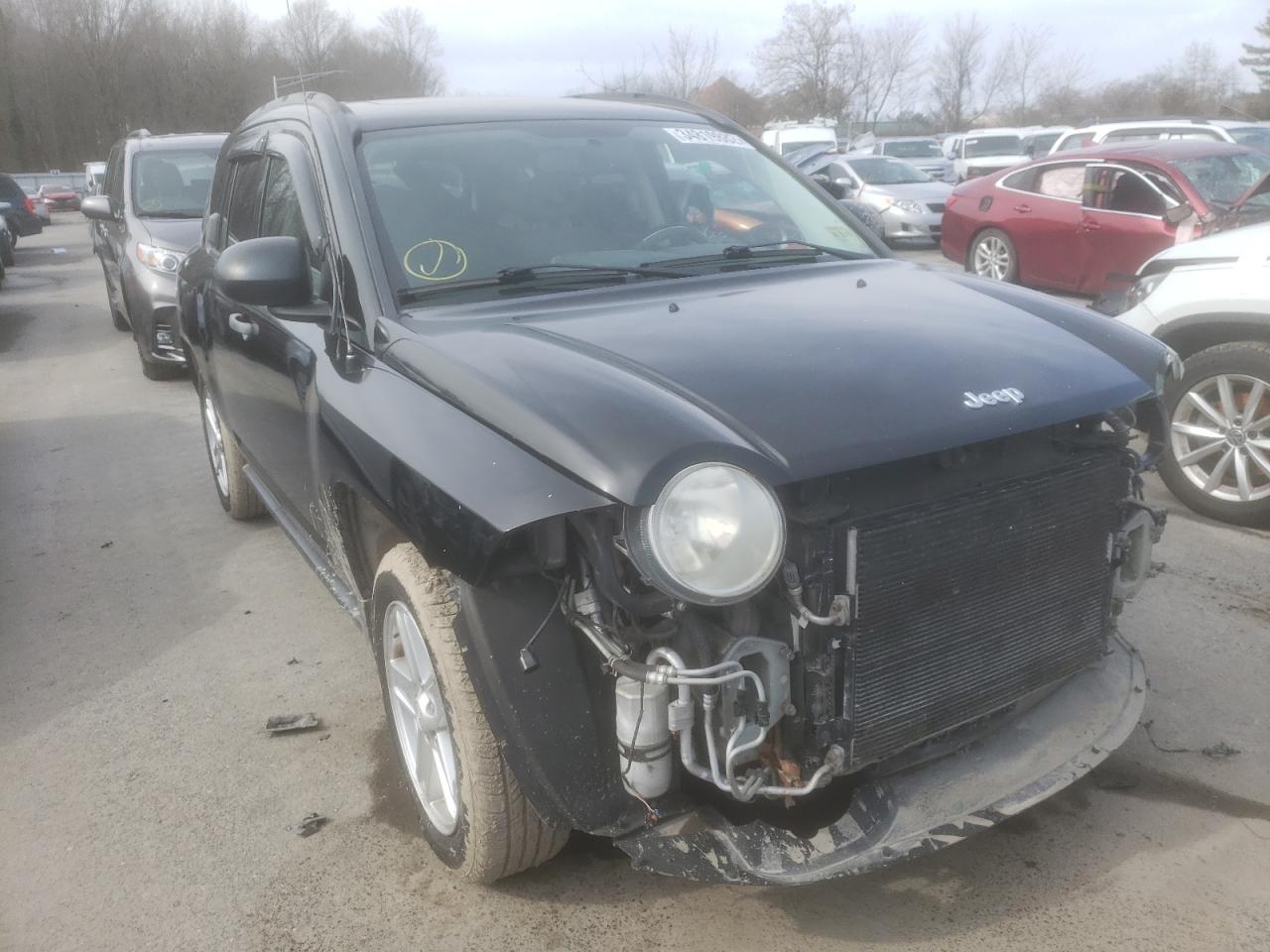 JEEP COMPASS 2007 with VIN 1J8FF47WX7D136593 - Photo from auction