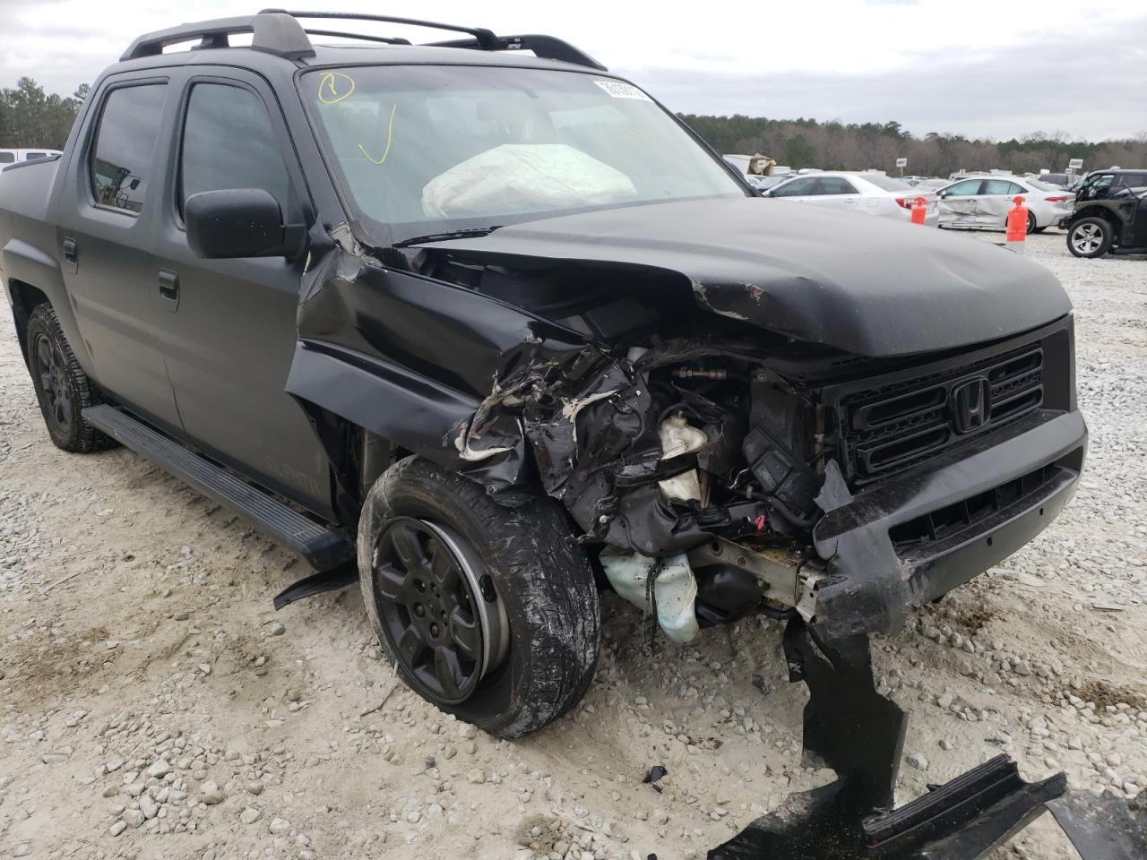Photo 9 from auction – 2006 HONDA RIDGELINE with VIN 2HJYK16516H511495