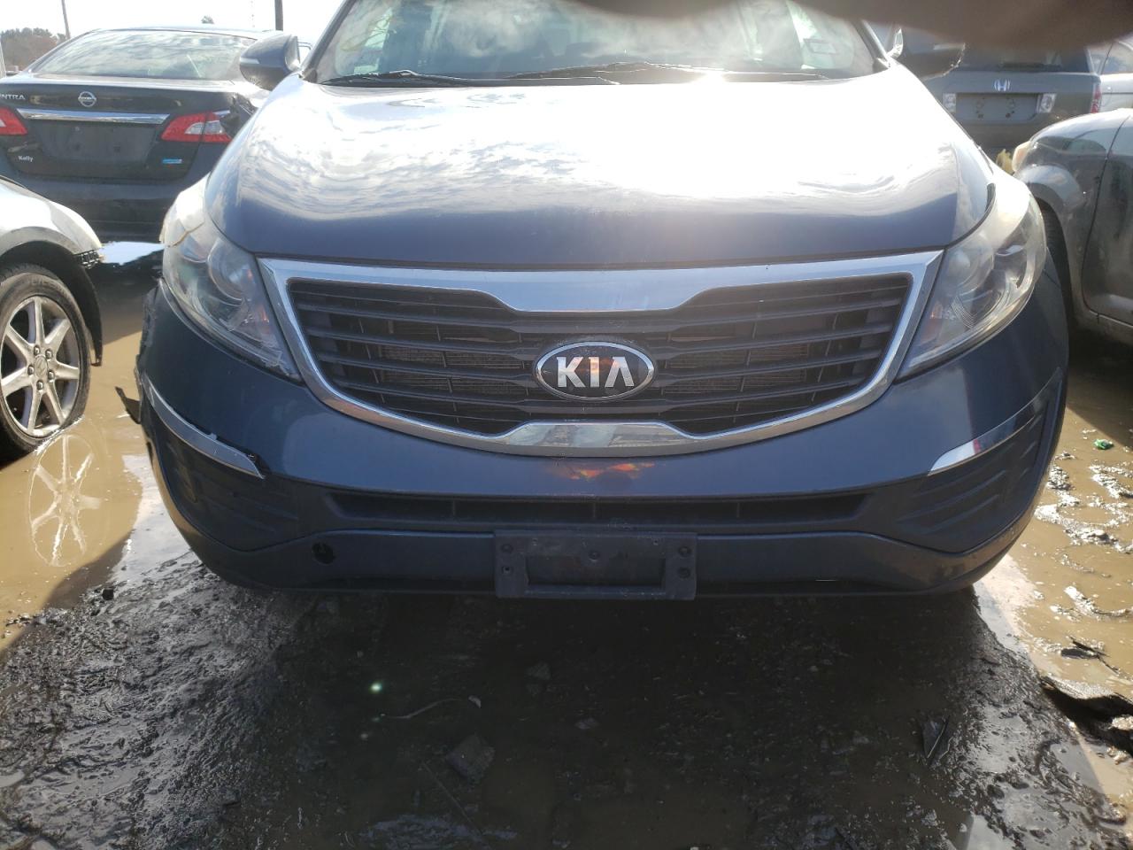 Photo 9 from auction – 2013 KIA SPORTAGE L with VIN KNDPBCA22D7499889