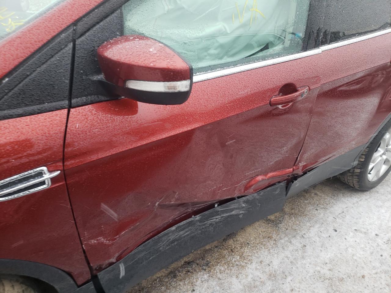 Photo 9 from auction – 2016 FORD ESCAPE TIT with VIN 1FMCU9J98GUB84458