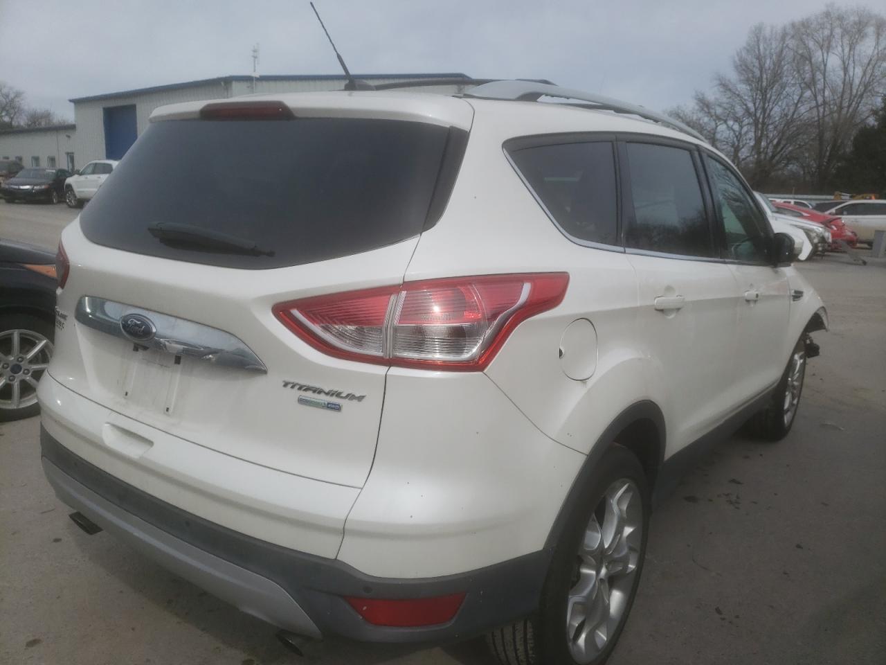 Photo 4 from auction – 2014 FORD ESCAPE TIT with VIN 1FMCU9J92EUB03953