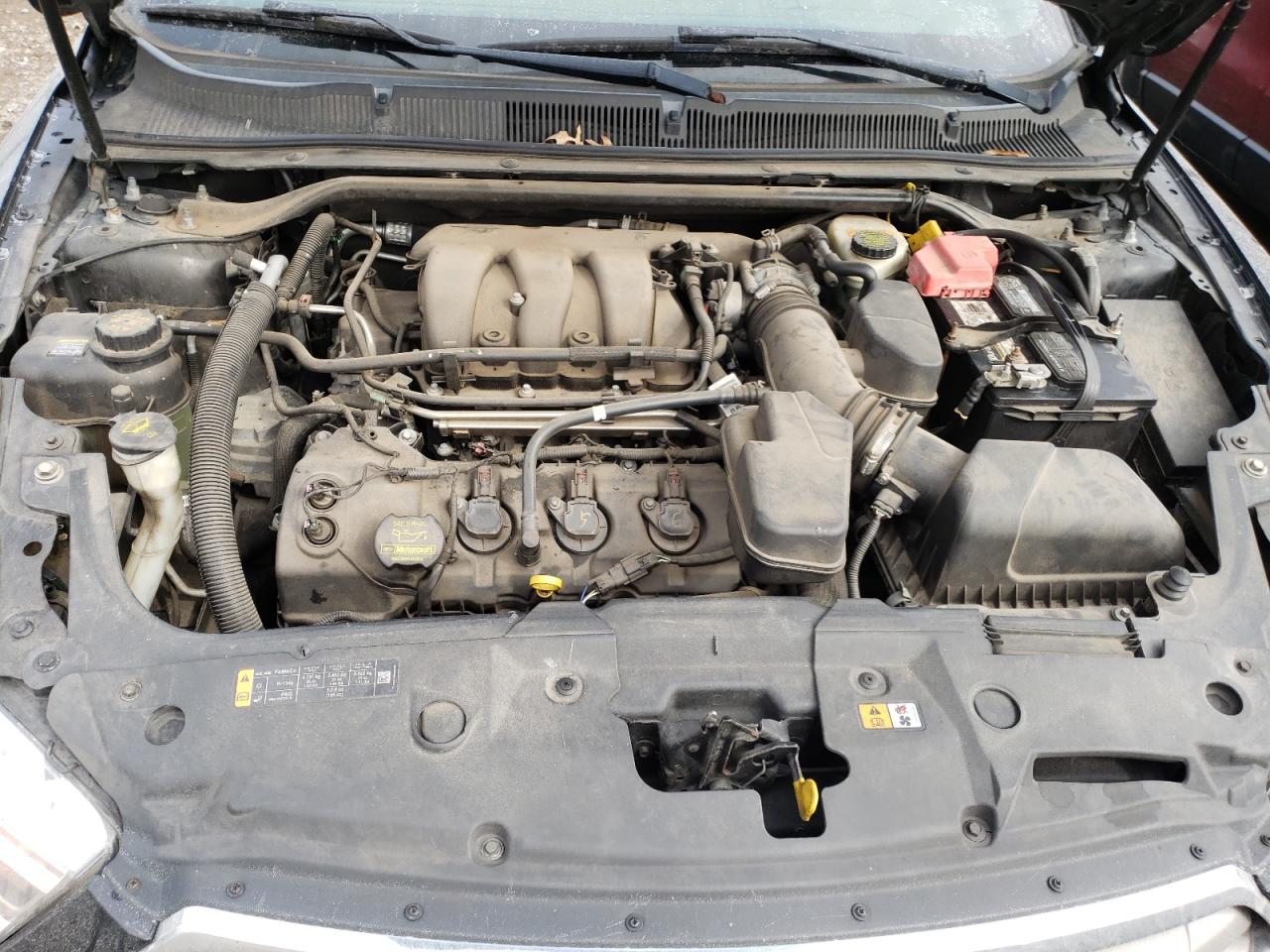 Photo 7 from auction – 2013 FORD TAURUS SEL with VIN 1FAHP2E80DG191284
