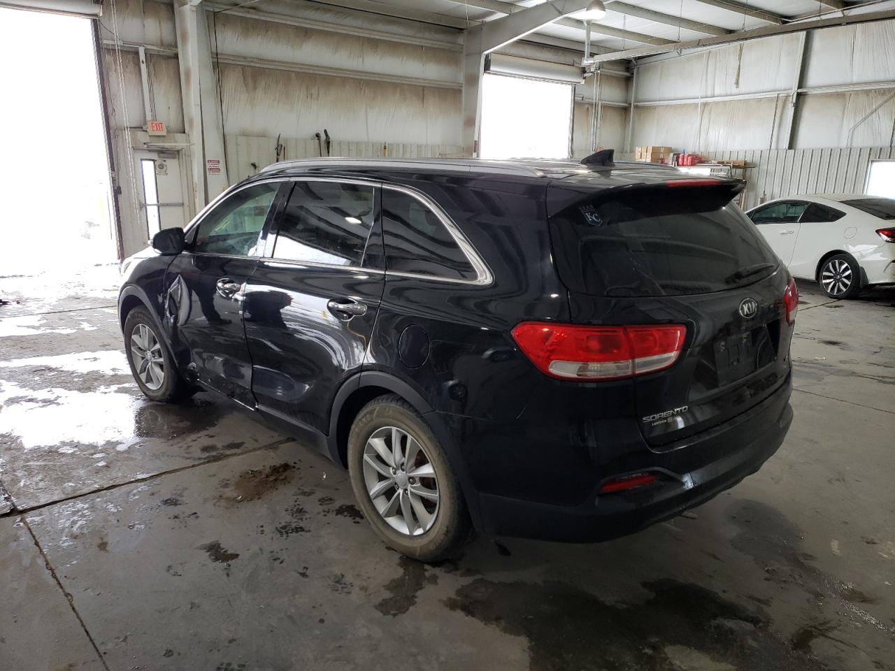 Photo 3 from auction – 2016 KIA SORENTO LX with VIN 5XYPGDA59GG037242