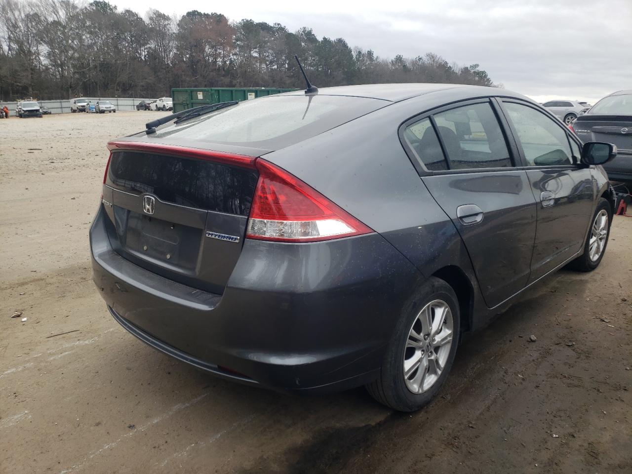 Photo 4 from auction – 2010 HONDA INSIGHT EX with VIN JHMZE2H78AS025903