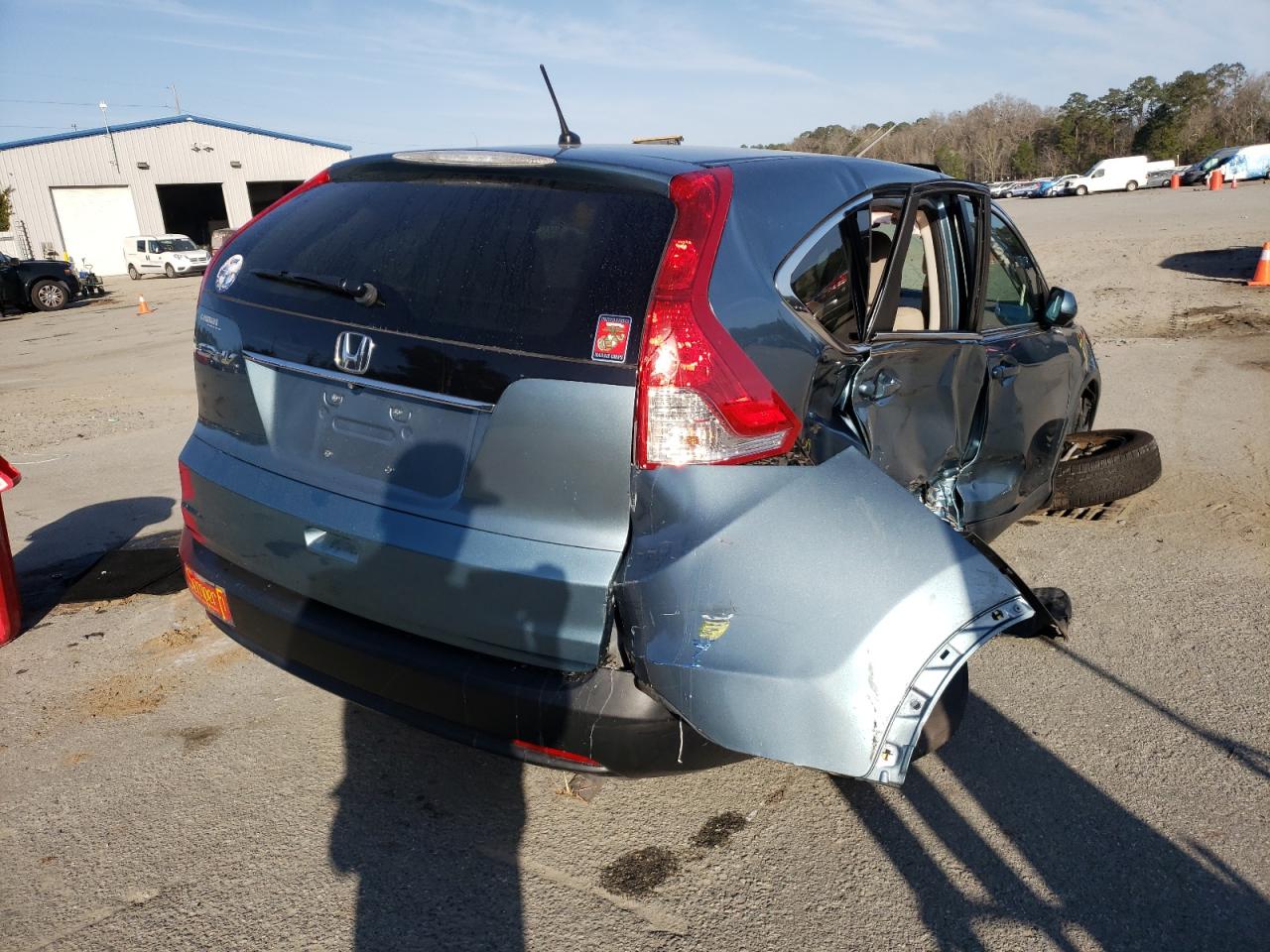 Photo 4 from auction – 2013 HONDA CR-V EX with VIN 5J6RM3H59DL023028