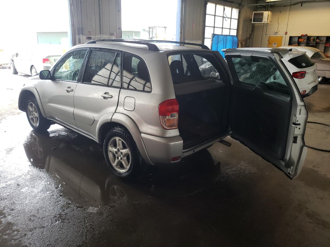 Photo 3 from auction – 2003 TOYOTA RAV4 with VIN JTEHH20V136073748