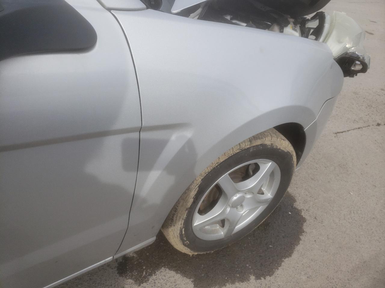 Photo 9 from auction – 2009 FORD FOCUS S with VIN 1FAHP34N69W211998