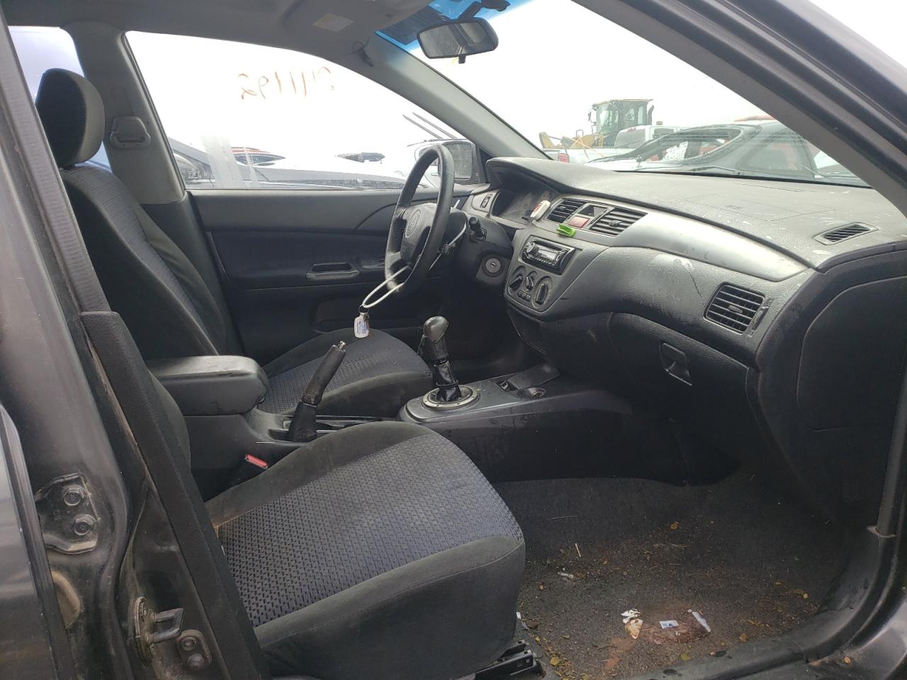 Photo 5 from auction – 2003 MITSUBISHI LANCER OZ with VIN JA3AJ86E83U002304