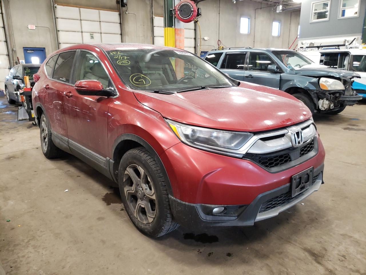 HONDA CR-V EXL 2017 with VIN 5J6RW2H87HL013215 - Photo from auction