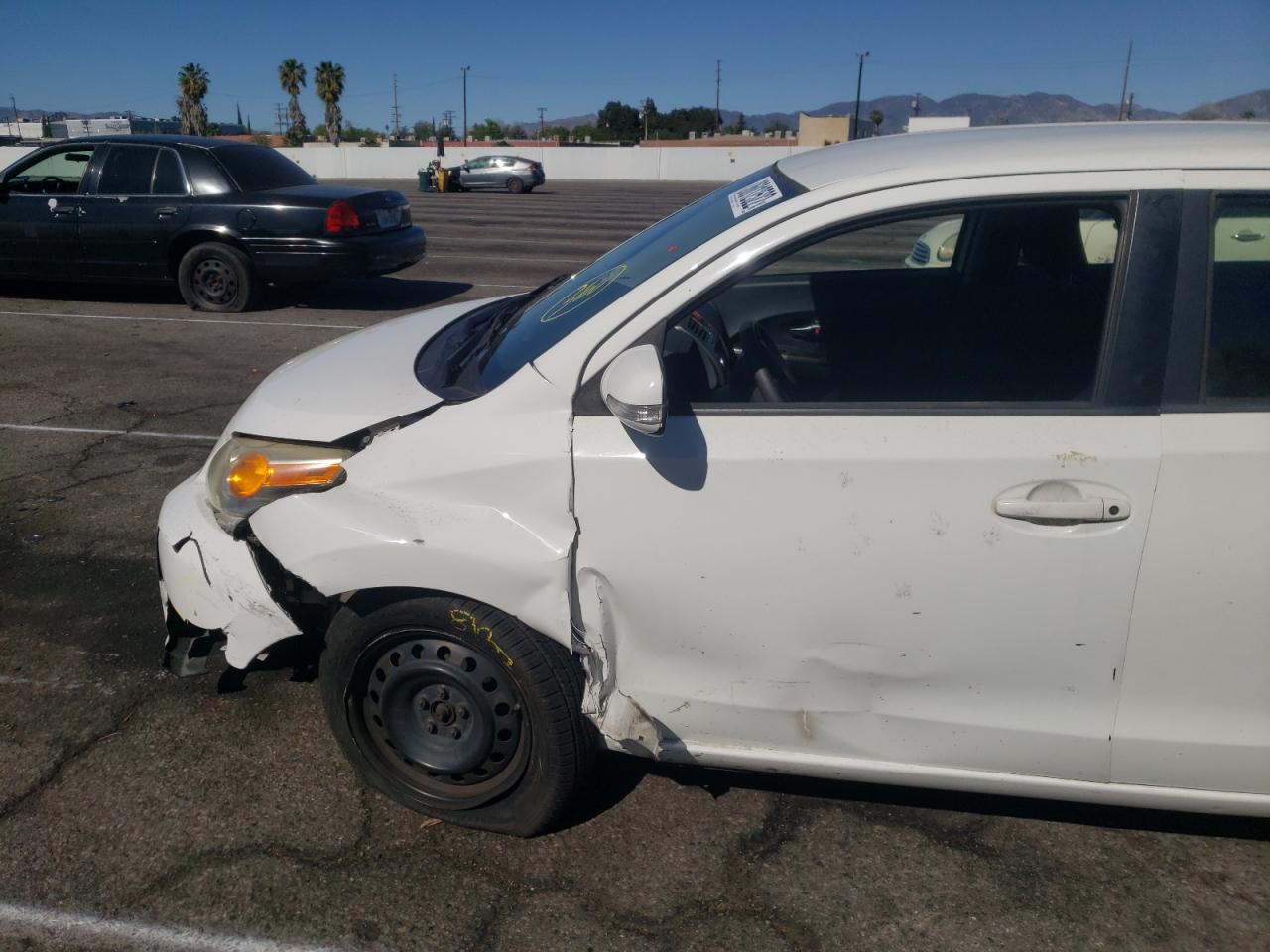 Photo 9 from auction – 2011 TOYOTA SCION XD with VIN JTKKU4B40B1014927