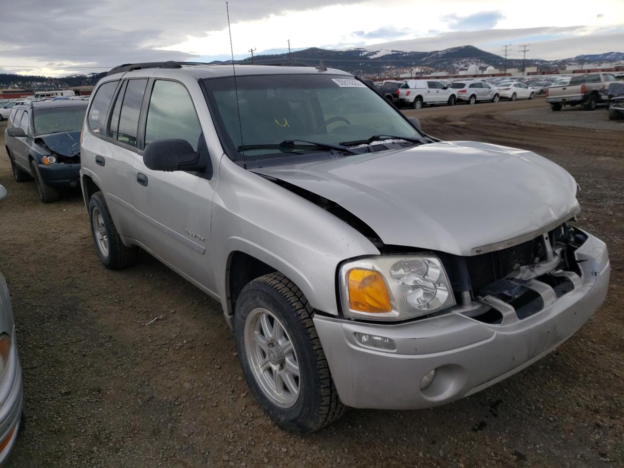 GMC ENVOY 2006 with VIN 1GKDT13S462306714 - Photo from auction