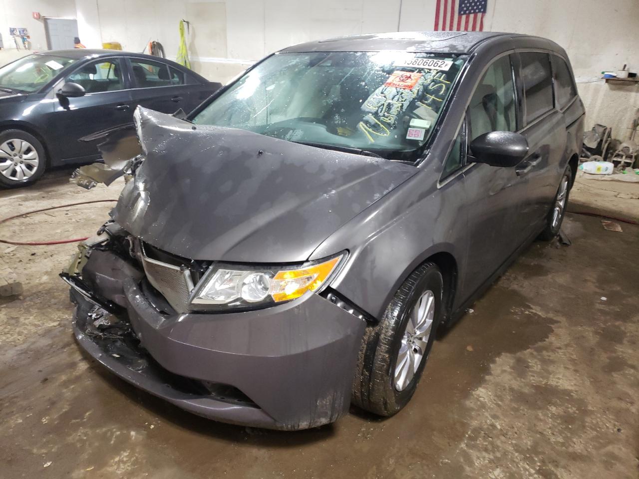 Photo 2 from auction – 2014 HONDA ODYSSEY EX with VIN 5FNRL5H61EB001347