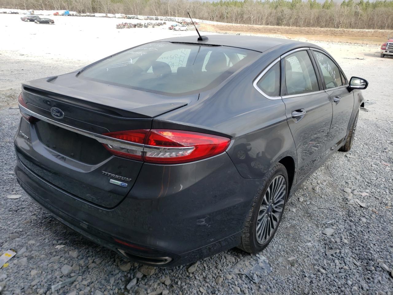Photo 4 from auction – 2017 FORD FUSION TIT with VIN 3FA6P0D98HR243328