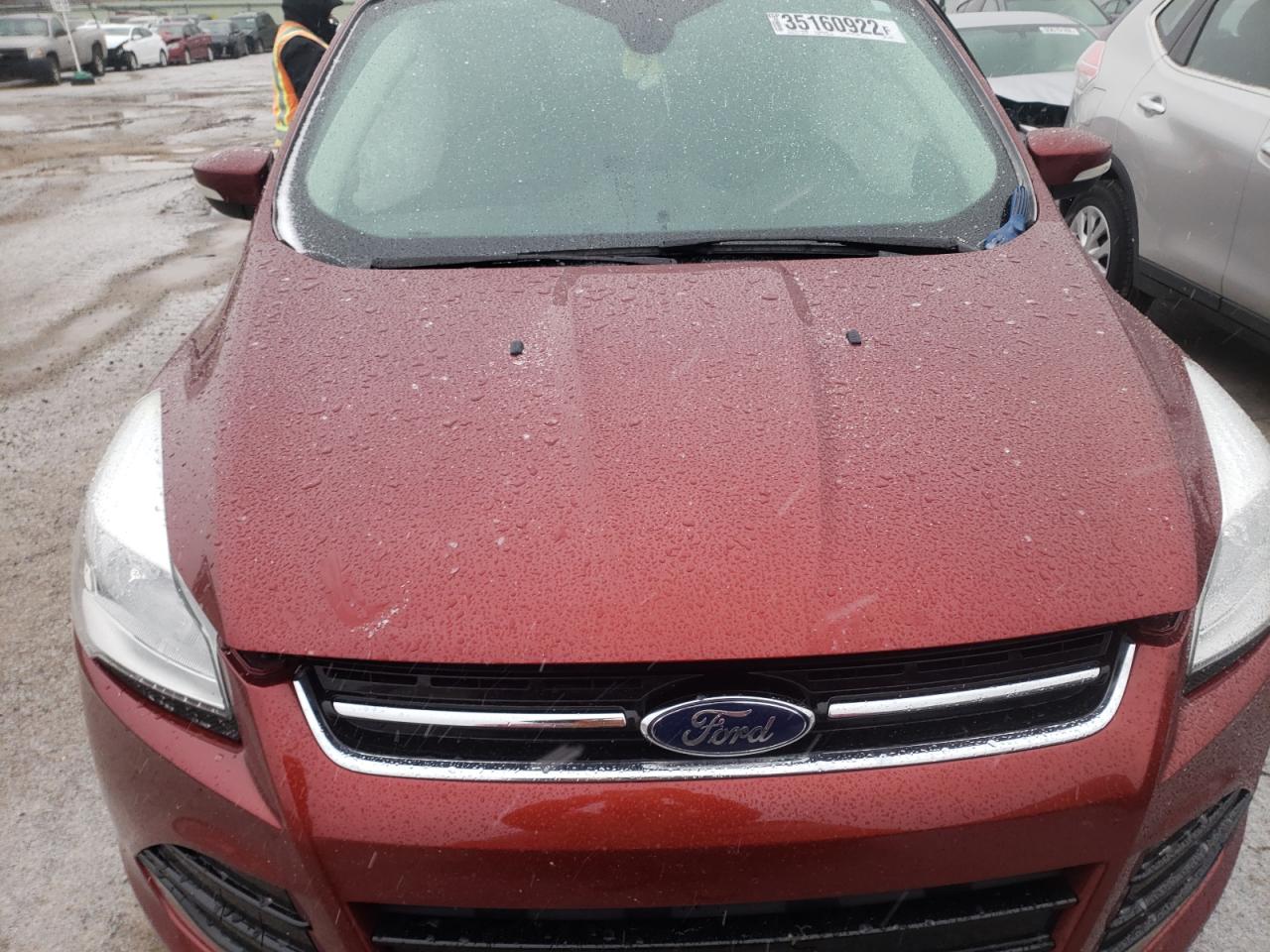 Photo 7 from auction – 2016 FORD ESCAPE TIT with VIN 1FMCU9J98GUB84458