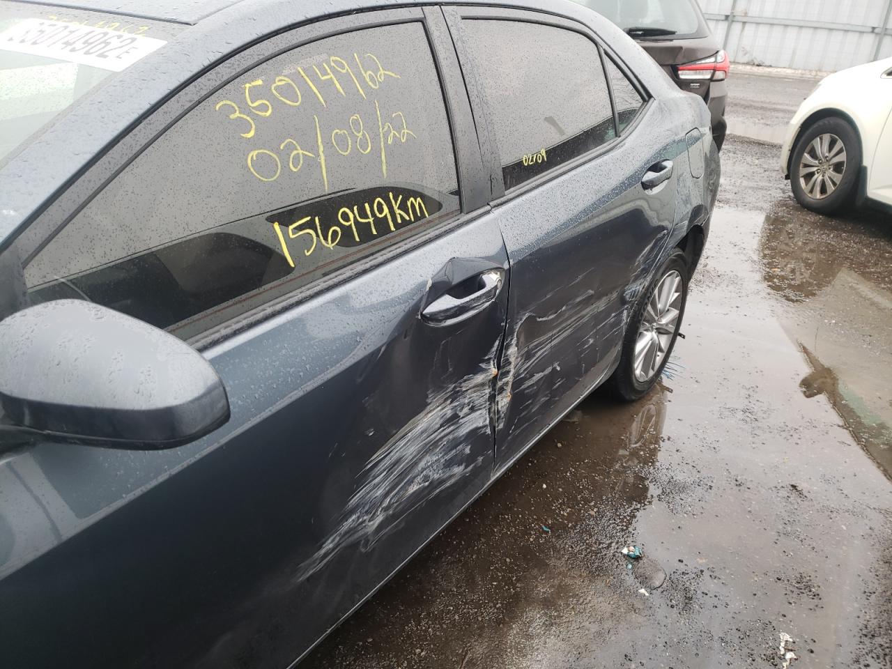 Photo 9 from auction – 2014 TOYOTA COROLLA L with VIN 2T1BURHE3EC114007