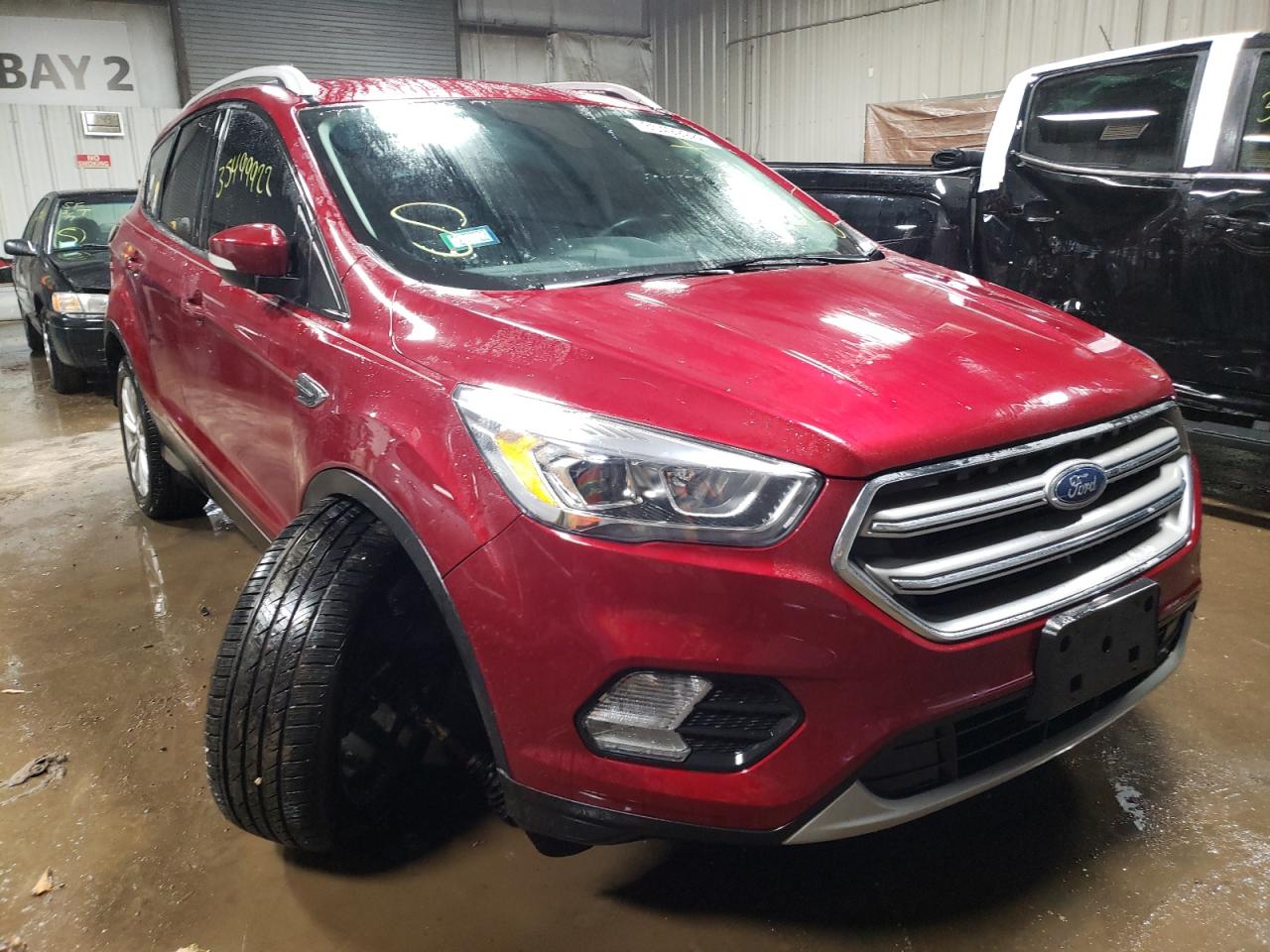 FORD ESCAPE TIT 2017 with VIN 1FMCU9JD6HUC64850 - Photo from auction