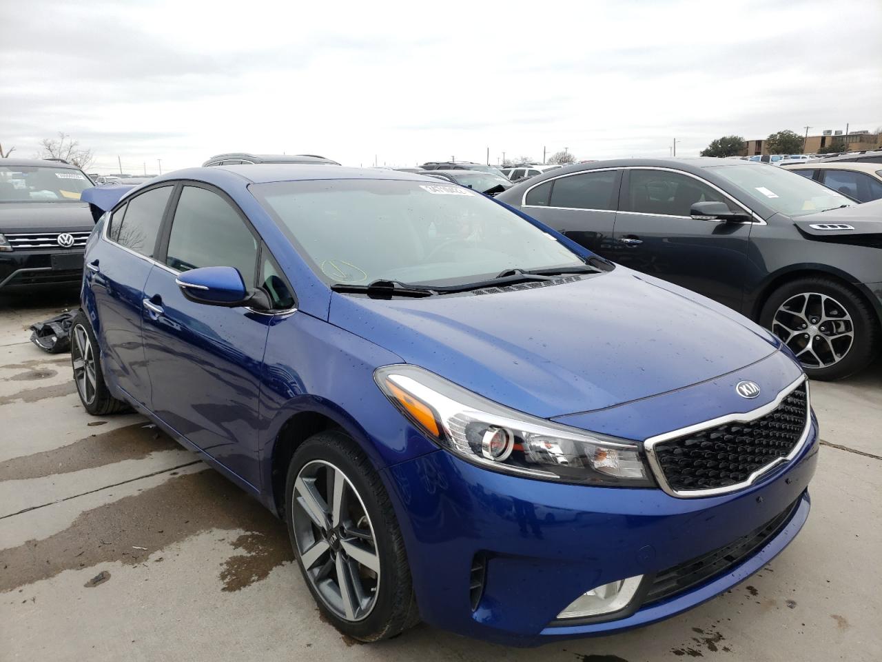 KIA FORTE EX 2017 with VIN 3KPFL4A87HE007141 - Photo from auction
