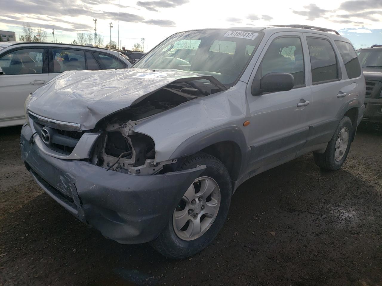 Photo 2 from auction – 2001 MAZDA TRIBUTE LX with VIN 4F2CU08111KM54844