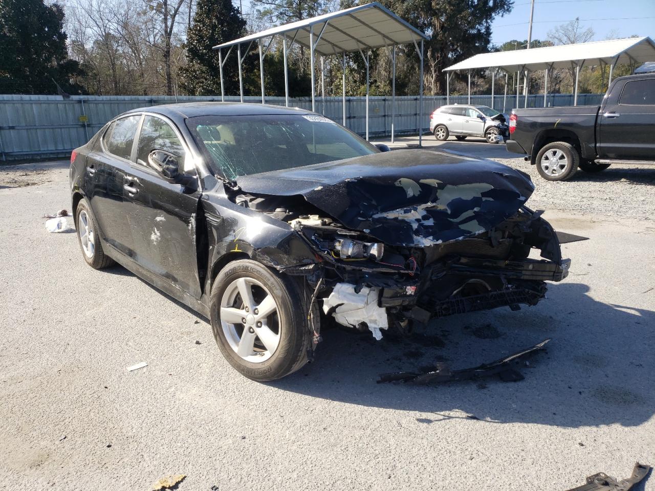 KIA OPTIMA LX 2015 with VIN 5XXGM4A72FG477395 - Photo from auction