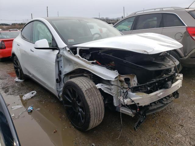 TESLA MODEL Y 2021 with VIN 5YJYGAEE0MF142929 - Photo from auction