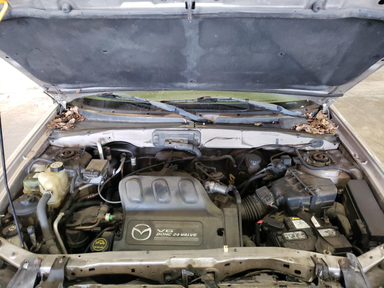 Photo 7 from auction – 2002 MAZDA TRIBUTE LX with VIN 4F2YU09152KM00520