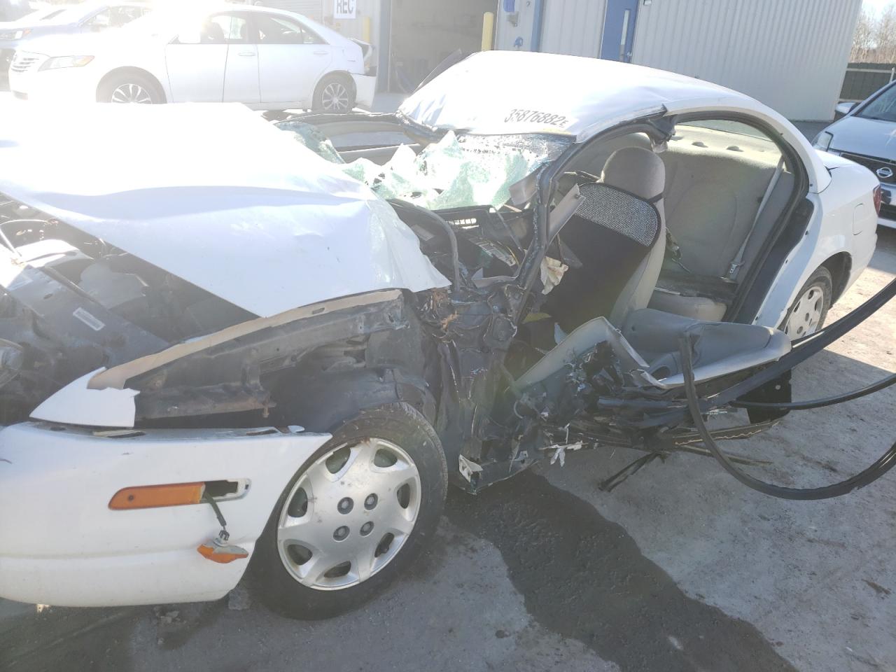Photo 9 from auction – 2000 SATURN SL1 with VIN 1G8ZH5289YZ249804