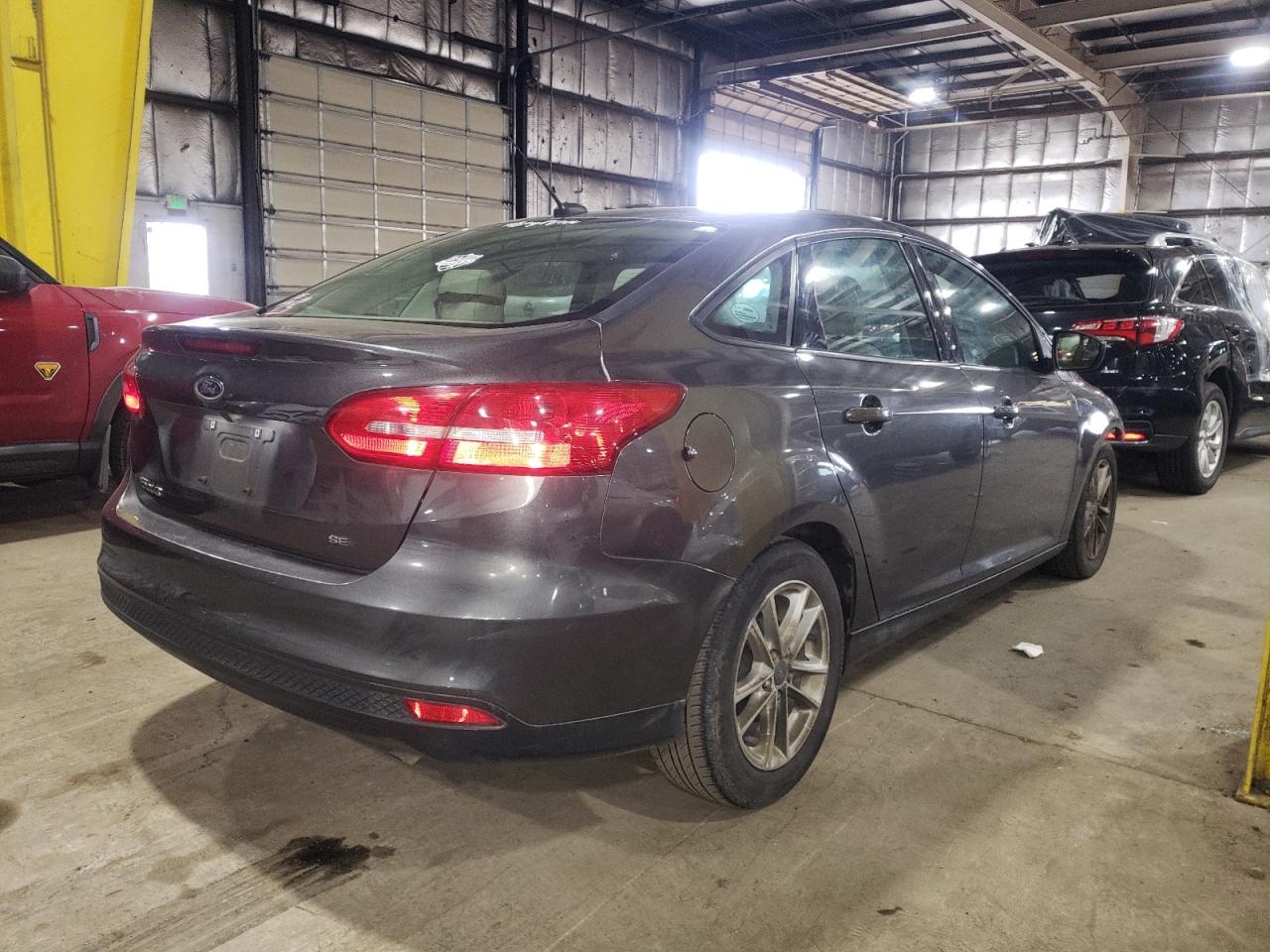 Photo 4 from auction – 2018 FORD FOCUS SE with VIN 1FADP3F22JL252569