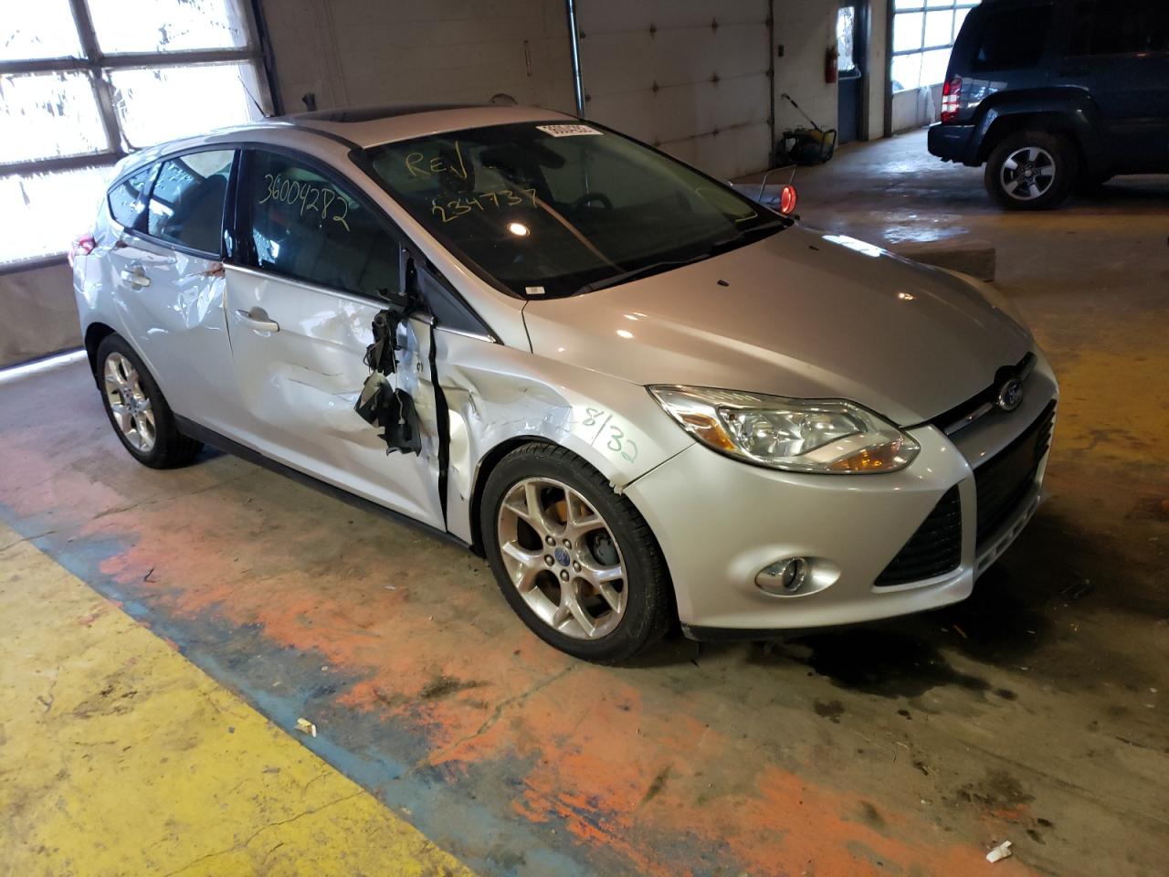 FORD FOCUS SEL 2012 with VIN 1FAHP3M27CL234737 - Photo from auction