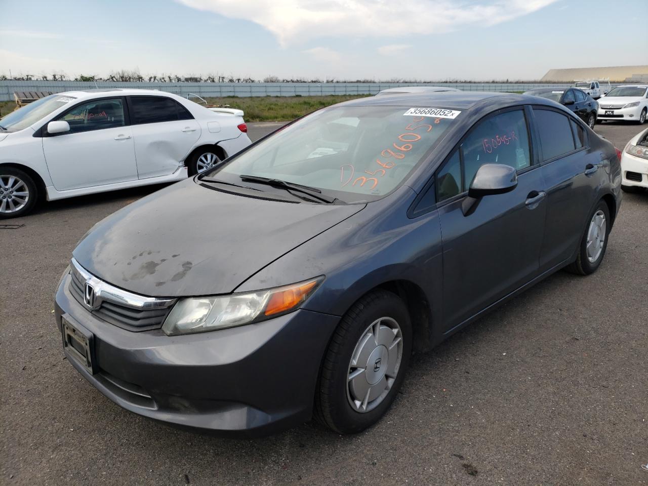 Photo 2 from auction – 2012 HONDA CIVIC HF with VIN 2HGFB2F67CH553919