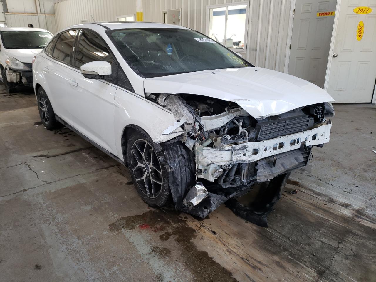 FORD FOCUS SE 2016 with VIN 1FADP3F27GL226820 - Photo from auction