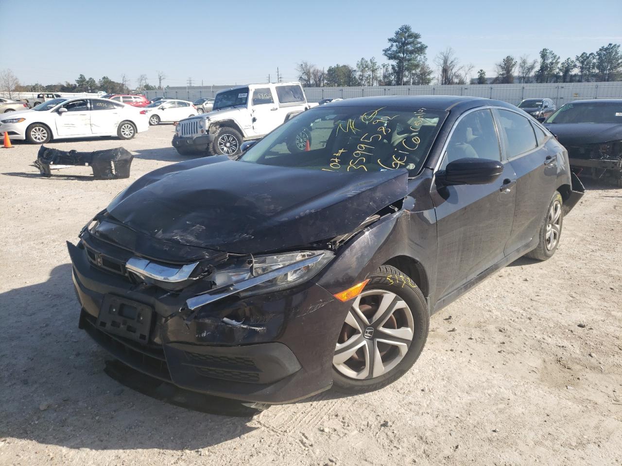 Photo 2 from auction – 2016 HONDA CIVIC LX with VIN 19XFC2F56GE045882
