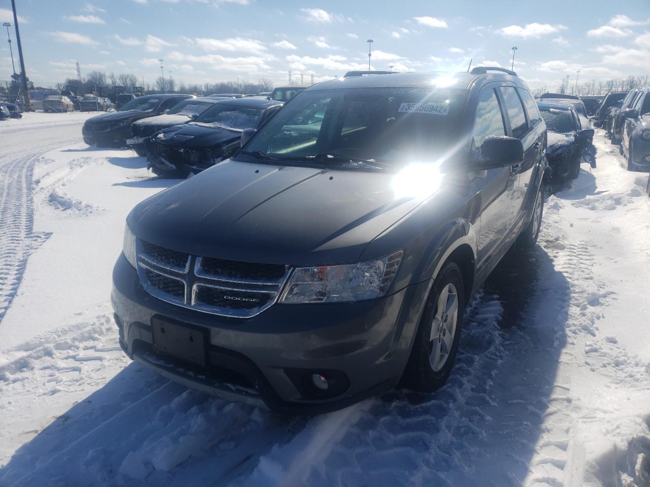 Photo 2 from auction – 2012 DODGE JOURNEY SX with VIN 3C4PDCBG3CT145622