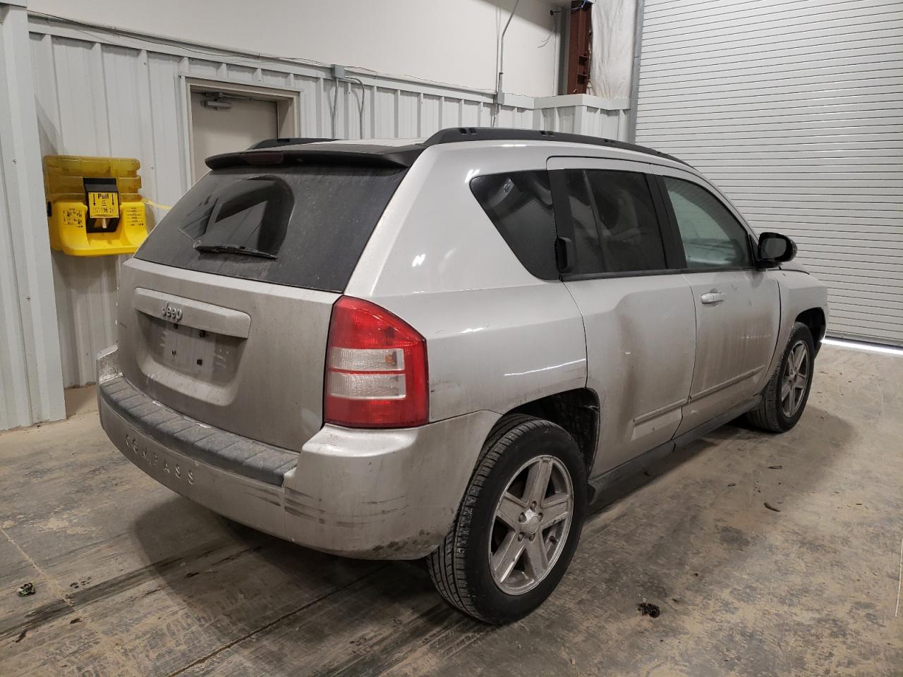 Photo 4 from auction – 2010 JEEP COMPASS SP with VIN 1J4NT4FB0AD521608